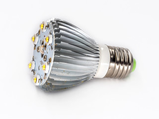 Opened led light with aluminum cooling housing shot on white.