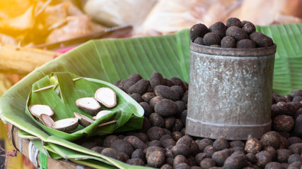 Mushrooms are baked in a cup that is sold on the street.