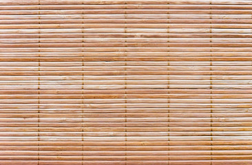 Rug of wooden slats. Background and texture of wooden mat.
