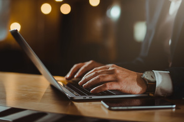 Businessman working on laptop in office