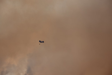 helicopter fighting wildfires in southern California