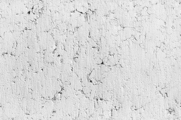 Concrete wall with cracked paint