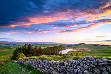 Crag Lough and Hadrian's Wall at Sunset, a UNESCO World Heritage Site in the beautiful...