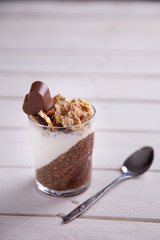Delicious breakfast, cocoa chia pudding with yogurt and cereals