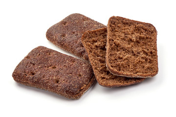 Slices of rye bread, crust, close-up, isolated on white background