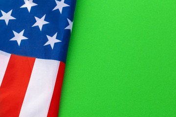 american flags against a green background
