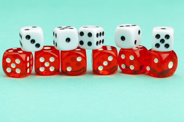 Gaming dices on blue background. Game concept.