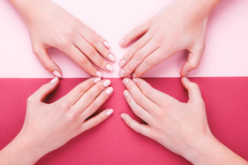 Stylish trendy female pink manicure.