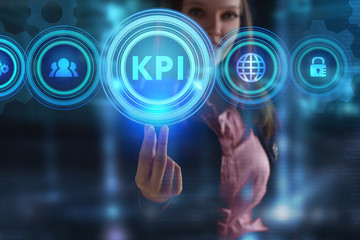 The concept of business, technology, the Internet and the network. A young entrepreneur working on a virtual screen of the future and sees the inscription: KPI