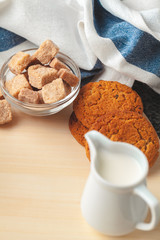 Tea with cookies on sackcloth background close up