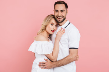 Fototapeta premium Happy beautiful couple standing isolated