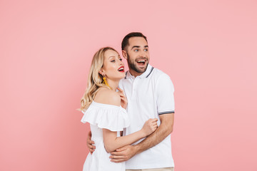 Happy beautiful couple standing isolated