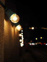 Small yellow light bulbs decorated on public walls