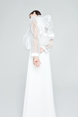 Young female with ring wearing trendy transparent jacket