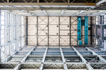 Wide Angle View Of A Tall Industrial Building, The View From The Bottom Up
