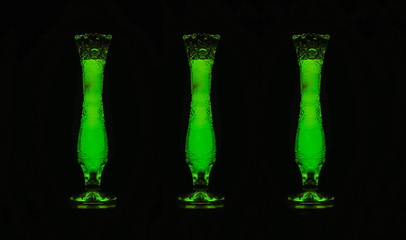 green bottles on the black background