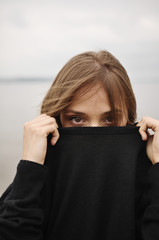 Stylish girl posing in stylish clothes