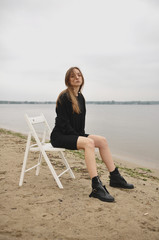 Stylish girl posing in stylish clothes