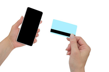 Man holding credit card in hand and entering security code using mobile phone.