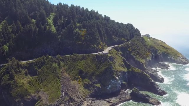 291 Pacific Northwest aerial pines houses the ocean and a cliff