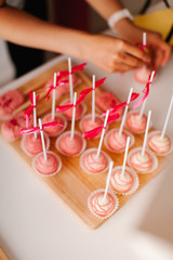 cake popsicle on a pink background