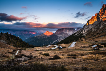 Obraz premium Beautiful alpine countryside. Scenic image of famous Sassolungo peak with overcast perfect blue sky. Wonderful Vall Gardena under sunlight. Majestic Dolomites Mountains. Amazing nature Landscape
