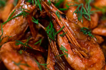 Prepared shrimps with dill close up texture background