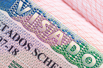 Stamp in the passport for travel and entry into Spain