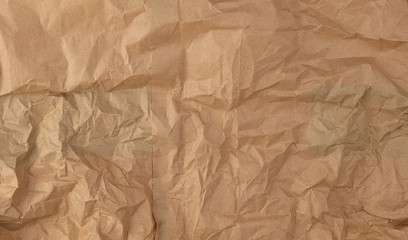 crumpled brown sheet of paper, full frame