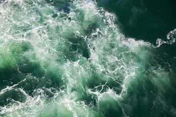 Fototapeta na wymiar blue green water in stormy sea