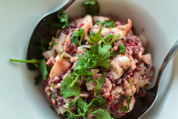 Octopus salad with coriander. Traditional portuguese cuisine