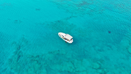 Aerial drone panoramic view photo of famous exotic paradise sandy deep turquoise beach of Elafonissi in South West Crete island, Greece