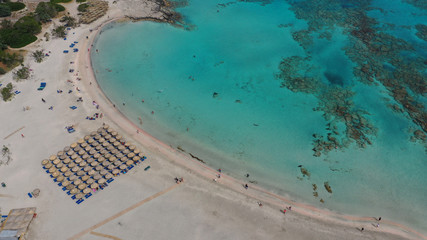 Aerial drone panoramic view photo of famous exotic paradise sandy deep turquoise beach of Elafonissi in South West Crete island, Greece