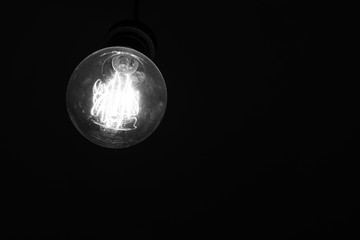 retro incandescent lamp on a black background