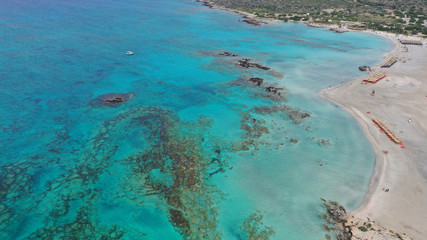 Aerial drone panoramic view photo of famous exotic paradise sandy deep turquoise beach of Elafonissi in South West Crete island, Greece