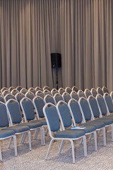 Empty blue chairs in conference hall - presentation room