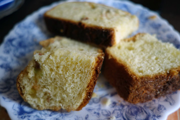 Pieces of cake on plate with blur effect.
