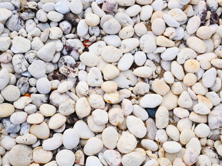 white pebbles stone background , smooth stone texture