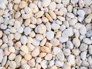 white pebbles stone background , smooth stone texture