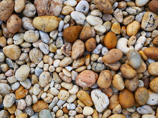brown stone background, smooth pebble stone background