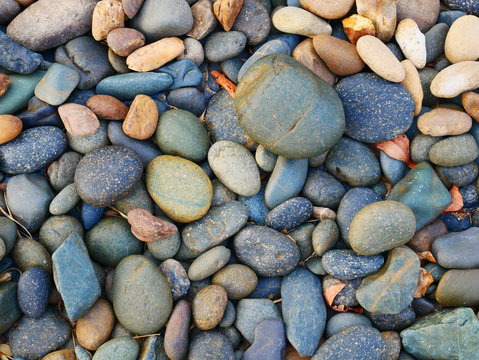 pebbles on the beach background, stone texture