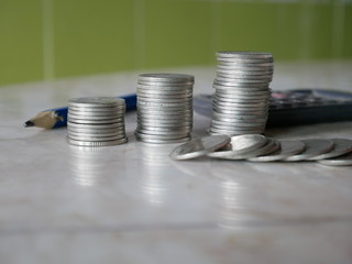stack coins on a desk , concept save money 