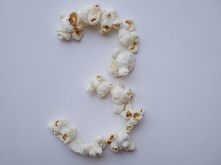 popcorn isolated white , concept food background