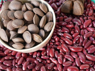 red soy beans on wooden background