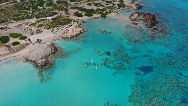 Aerial drone panoramic view photo of famous exotic paradise sandy deep turquoise beach of Elafonissi in South West Crete island, Greece © aerial-drone