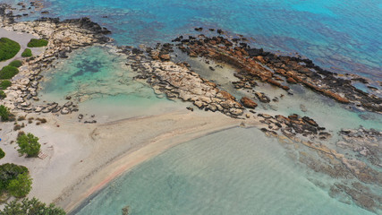 Aerial drone panoramic view photo of famous exotic paradise sandy deep turquoise beach of Elafonissi in South West Crete island, Greece