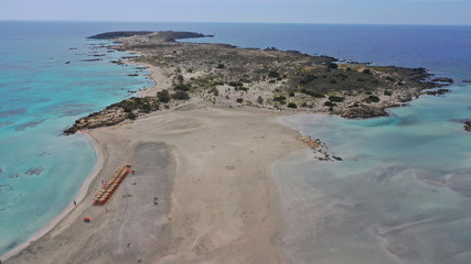 Aerial drone panoramic view photo of famous exotic paradise sandy deep turquoise beach of Elafonissi in South West Crete island, Greece