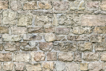 Fragment of an old stone fortress wall for use as an abstract background and texture.