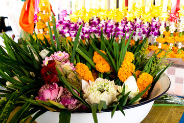 Colorful flower for buddhist worship in thailand temple