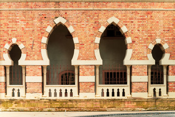 The red brick wall backgrounds  with arch windows malaysia architecture design - 271467502